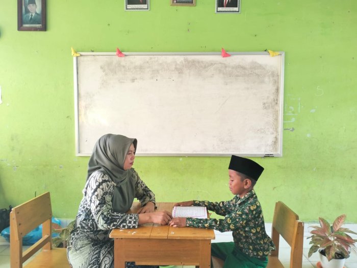 Semangat Adelia Azzahra dan Naufal Azam Belajar Tartil untuk FASI Kabupaten Tebo
