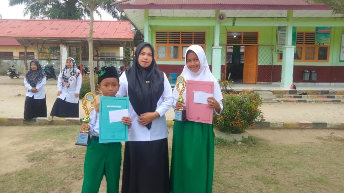 Bu Dian Utami Ningsih, S.Pd.I Sukses Antar Siswa MIN 3 Tebo Raih Juara Tartil FASI 2025