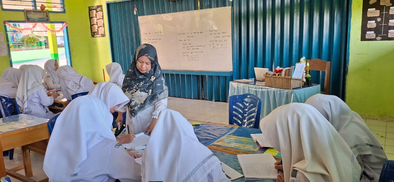 Peran Aktif Yessy Gusminalita, M.Pd., Wakil Kepala Bidang Kesiswaan, dalam Mendukung Program Peningkatan Mutu Pendidikan di MAN 1 Kerinci